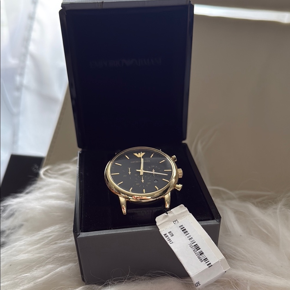 Emporio Armani Gold and Black Watch with Elegant Design